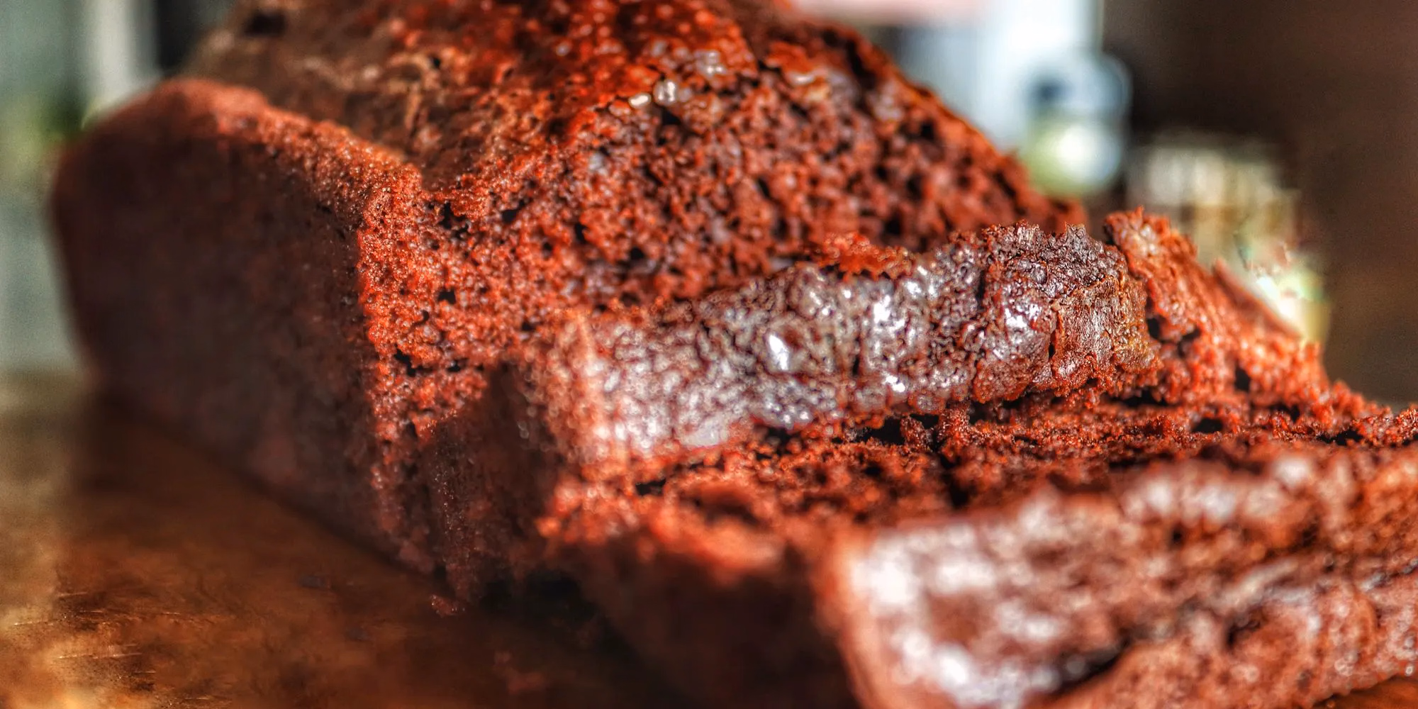 A chocolate coffee loaf cake, sliced to show the crumb
